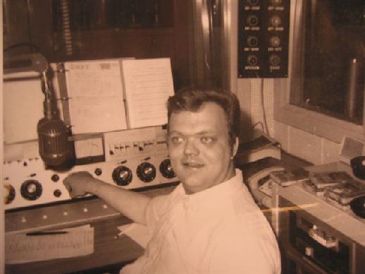 This is Jim Dandy's second time at WDGY-AM. This photo was taken in 1969 after he came back to replace Rob Sherwood when he left for KDWB-AM. The turntables (pre-historic CD players) are out of the shot to his left side.